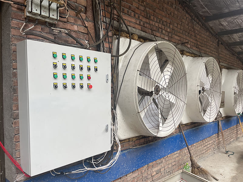 Fans and a smart distribution cabinet at a livestock facility